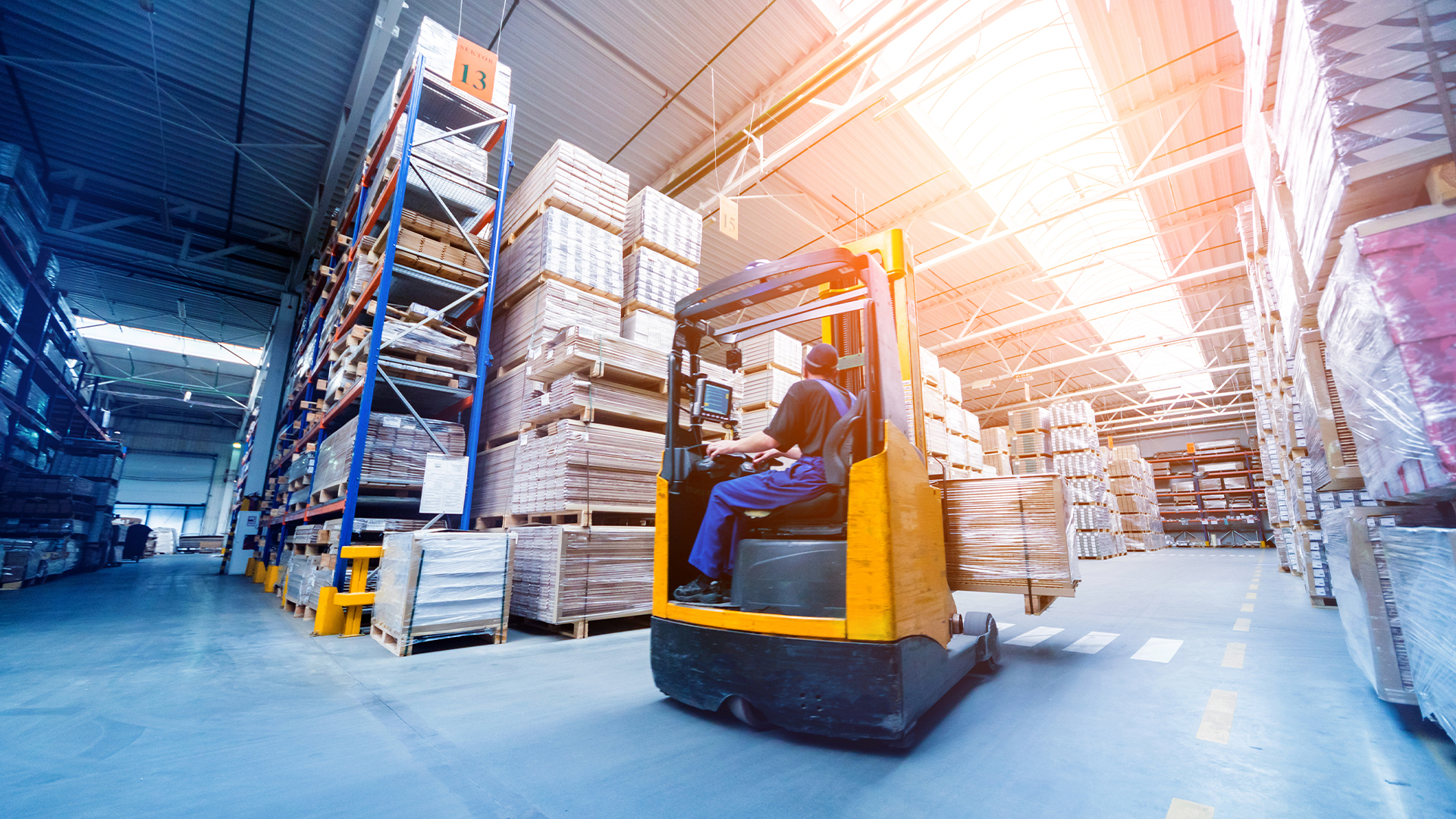 Forklift loader in storage warehouse ship yard.