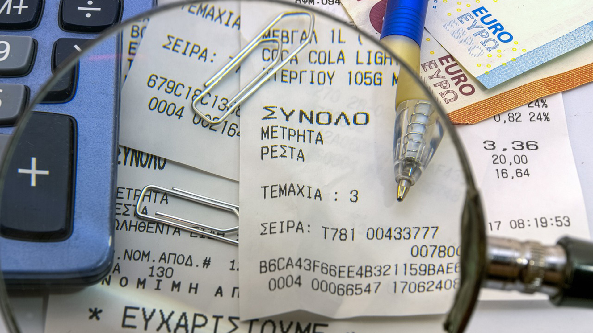 receipts under magnifying glass
